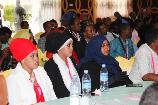 Female Journalists Concentrating on the sessions.